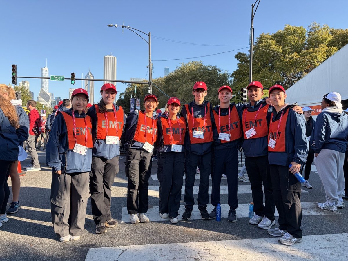 NEMO EMTs in orange EMT vests at the 2026 Chicago Marathon